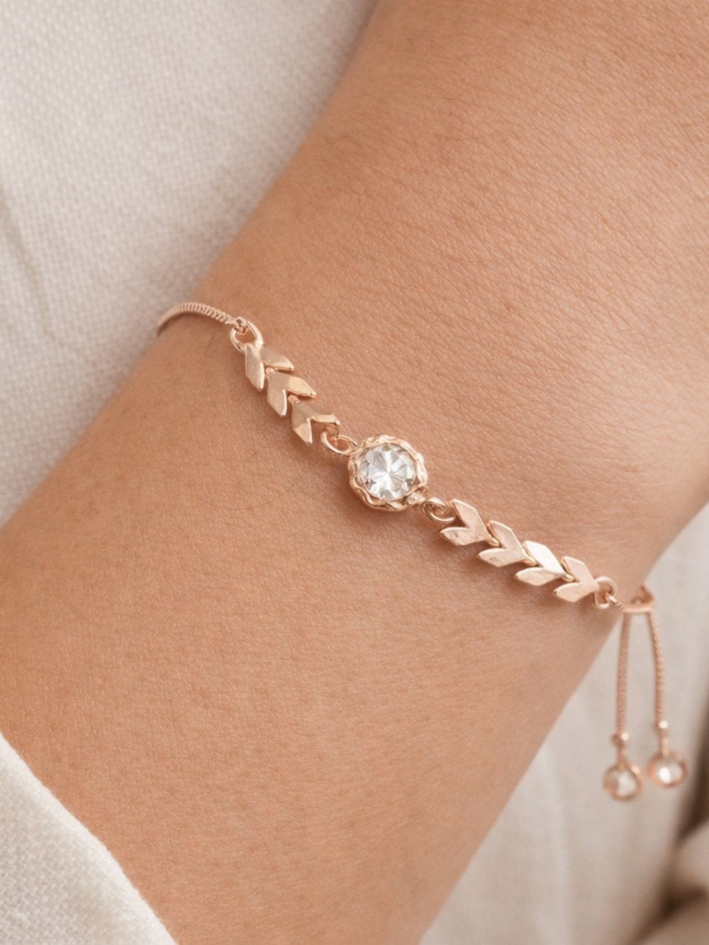 Rose gold tone with crystals slide stunning slide bracelet. (Bolo)